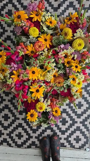 Summer subscription bouquets of sunflowers, zinnias and snapdragons