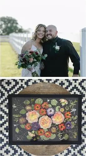 A rich bridal bouquet of peach roses and burgundy blooms, then pressed and framed in black